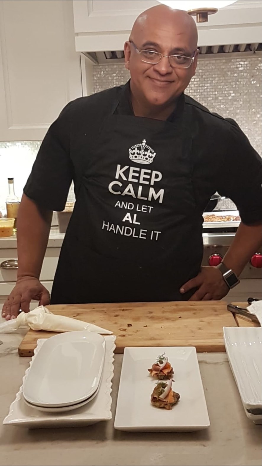 Chef Al of OmegaFoodService.ca plating canapés in the kitchen